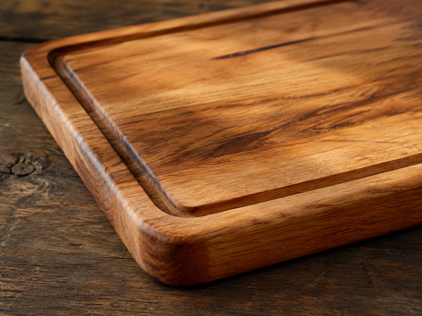 Wooden chopping board with a juice groove around the edge